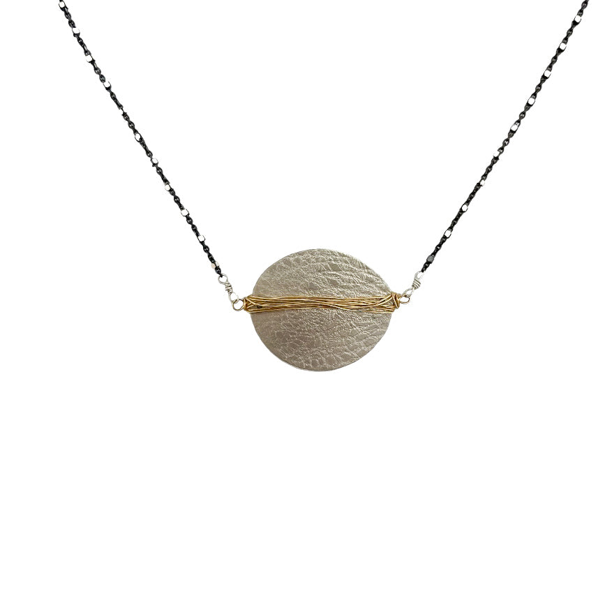 gold-filled and sterling silver textured disc with gold fill wrap and black glitter chain