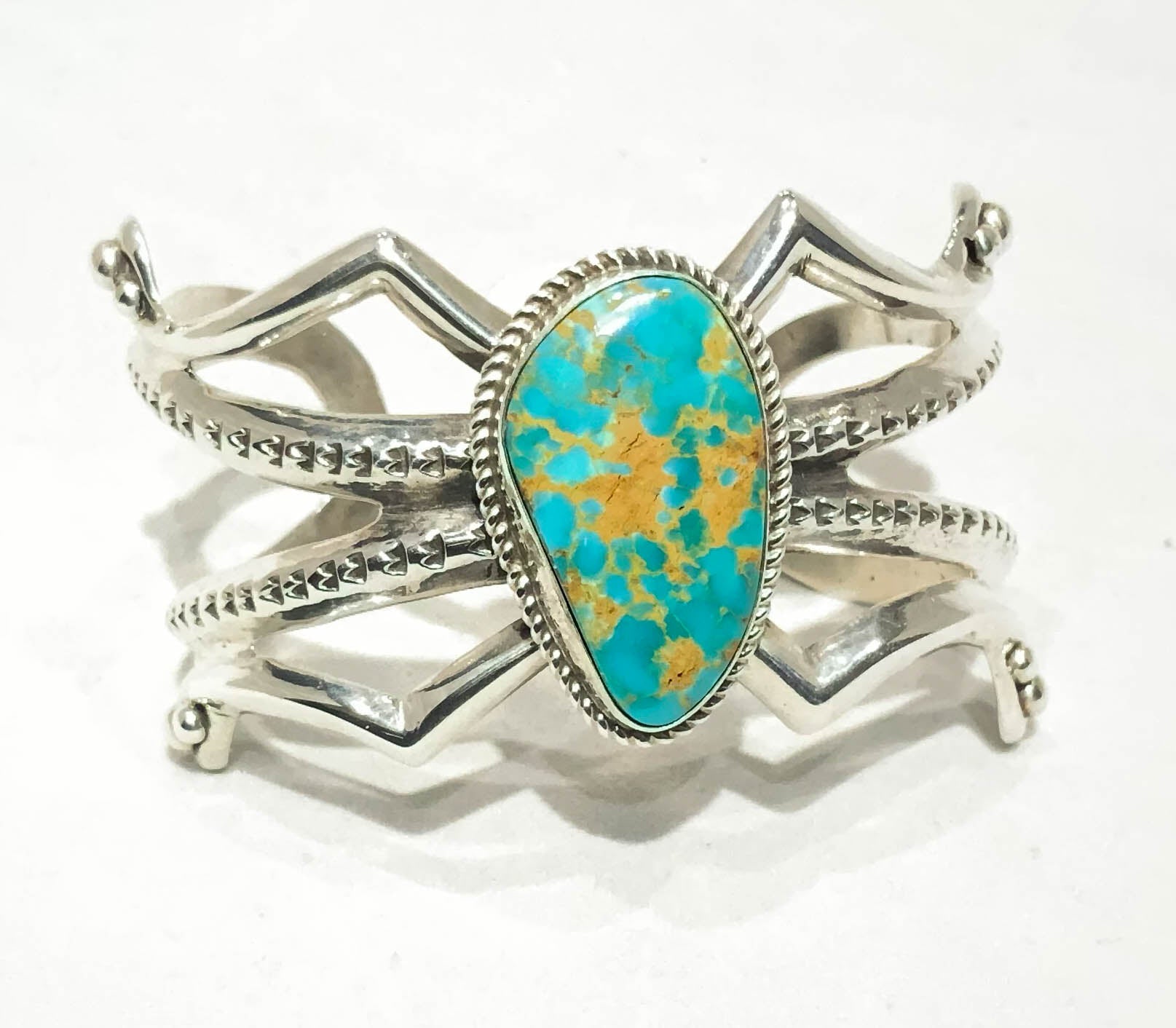 SANDCAST CUFF WITH TURQUOISE STONE